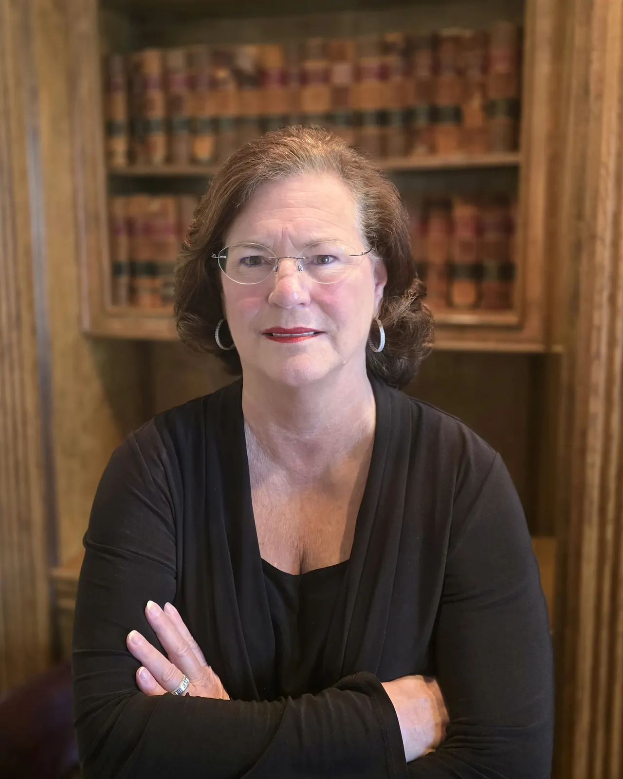 Attorney M. Judith Barnett in the Barnett Law Firm library.